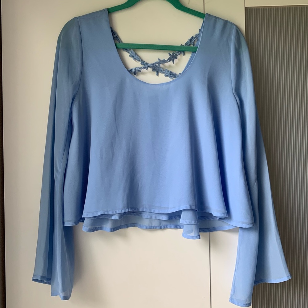 Bell sleeve crop top with floral cross back